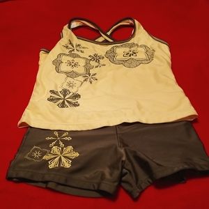 This is a two piece tank and shorts, army green and yellow coloring.  Says XL
